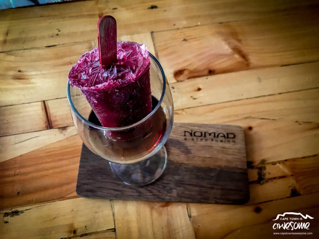 NOMAD Bistro and Bar serves a Red Wine "Adult" Popsicle that is quite fun.