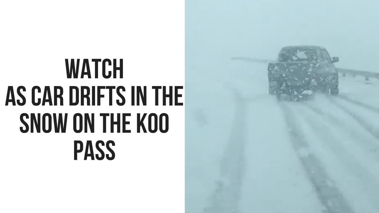 Watch as Car drifts in the snow on Koo Pass